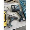 Image 2 : MKIAT IMPACT AND DRILL SET WITH ONE BATTERY AND CHARGER, AND PARTIAL MAKITA BIT SET