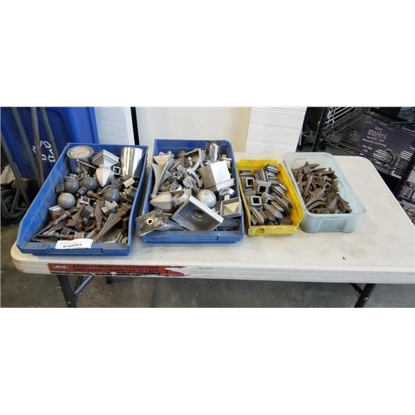 4 BINS OF DECORATIVE METAL FENCE CAPS
