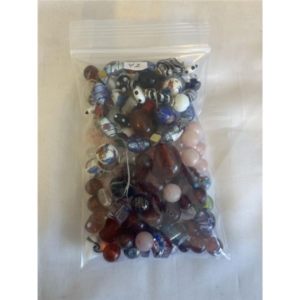 LARGE COLLECTION OF GLASS AND PORECELAIN BEADS