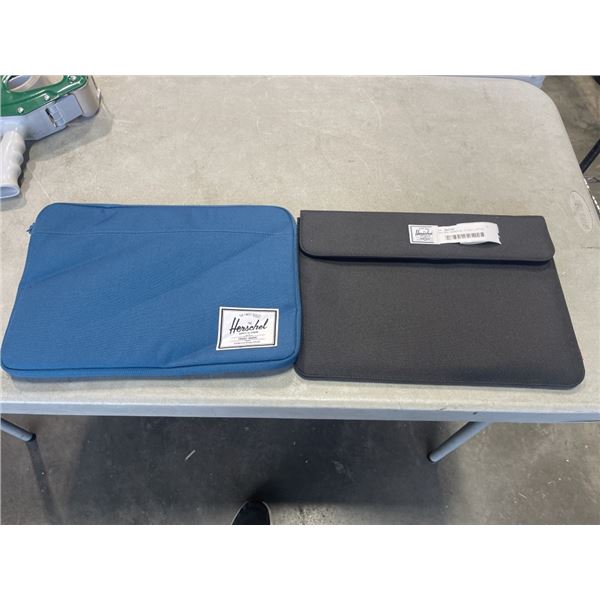 2 AS NEW HERSCHEL 15 INCH  LAPTOP SLEEVES.