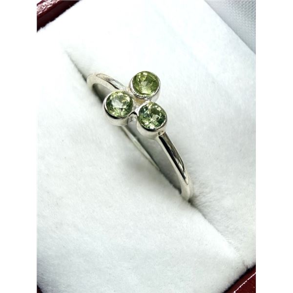 STERLING SILVER NATURAL PERIDOT RING, SIZE 7.25, RETAIL $200.00. PERIDOT IS THE BIRTHSTONE FOR AUGUS