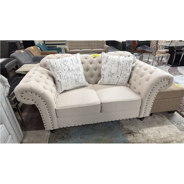 STUDDED FABRIC BUTTON BACK LOVESEAT WITH THROW PILLOWS