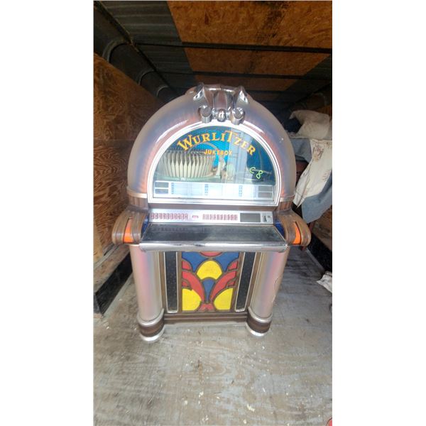 Wurlitzer Jukebox with Stained Glass Panel and Chrome Accents Modle 1050