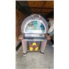 Image 1 : Wurlitzer Jukebox with Stained Glass Panel and Chrome Accents Modle 1050
