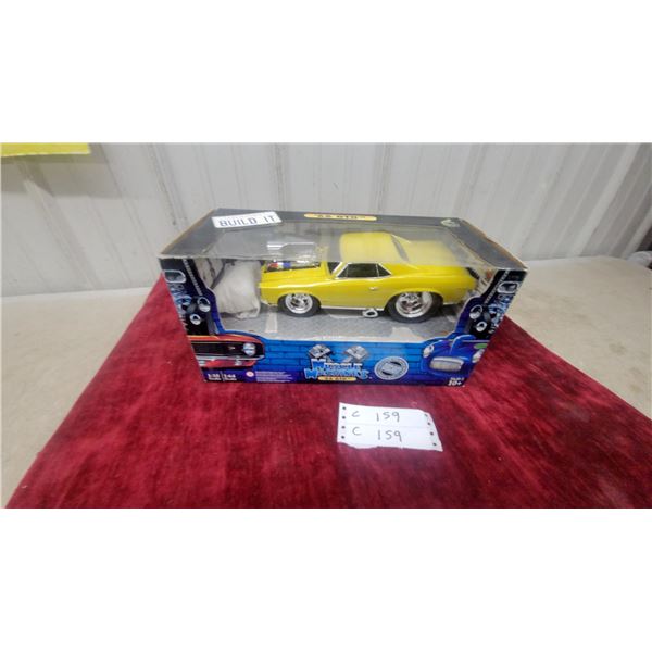 Muscle Machines '66 GTO 1:18 Scale Die-Cast Model Car in Yellow with Box