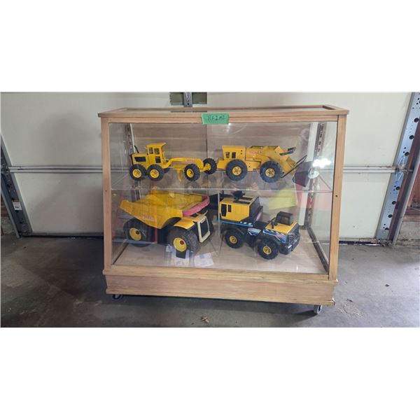 Four Tonka Toys in Glass Display Case on Wheels 46 in. x 40 in. x 23 in.