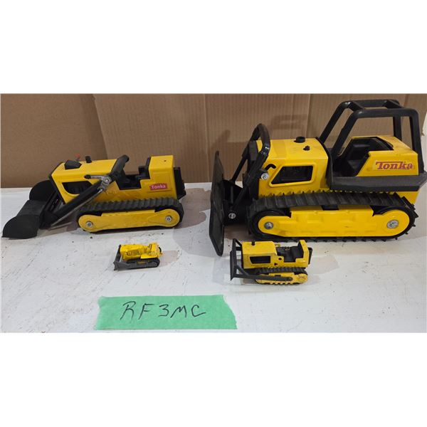 Four Different Size Tonka Crawlers.