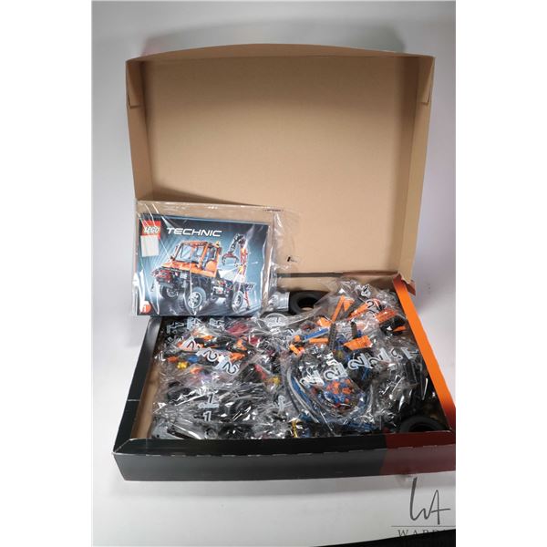 Lego-Technics" Unimog U400" no. 8110 new with factory sealed bags in opened factory box. Appears com