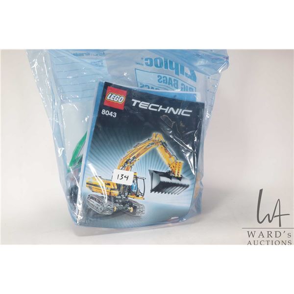 Lego-Technics "Motorized Excavator" no. 8043. Pre-built kit. Completeness not confirmed. Includes bu