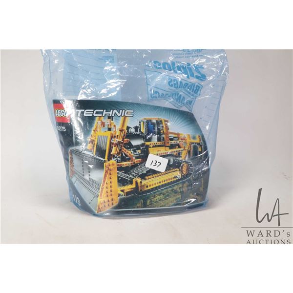 Lego-Technics "Motorized Bulldozer" no. 8275. Pre-built kit. Completeness not confirmed. Includes bu