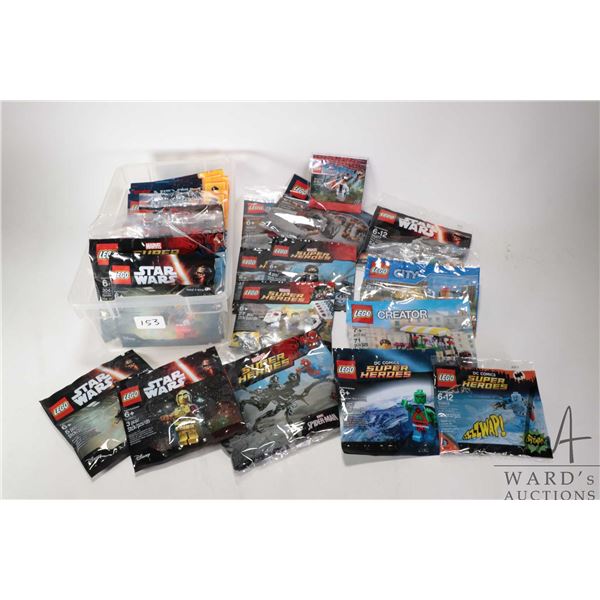 Approximately twenty five Lego packaged building kits including Minifigures, Marvel Super Heroes, Ha