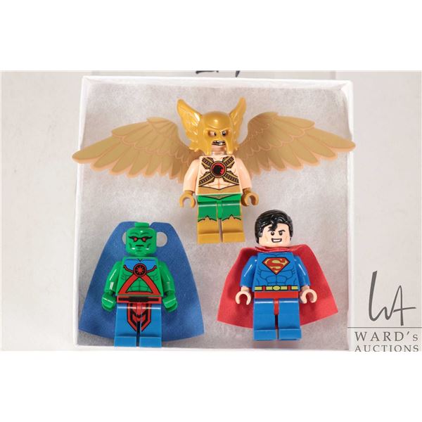 Three DC Minifigures including Superman, Hawkman and Martian Manhunter