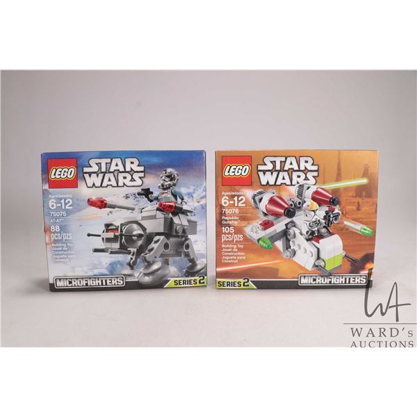 Two Lego- Star Wars building kits including "AT-AT" no. 75075 and "Republic Gunship" no. 75076. Both