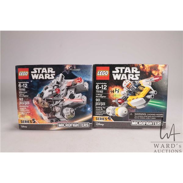 Two Lego- Star Wars building kits including "Y-Wing Microfighter" no. 75162 and "Millennium Falcon M