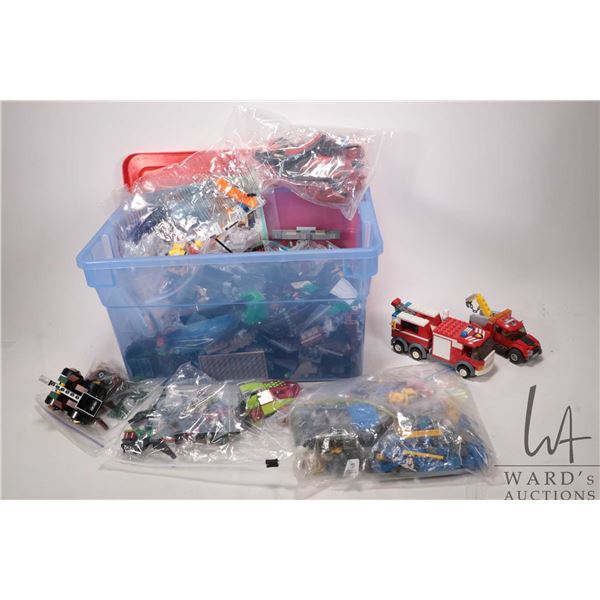 Selection of Lego pre-built kits and building bricks including Lego Pirates, Lego City, Minifigures 