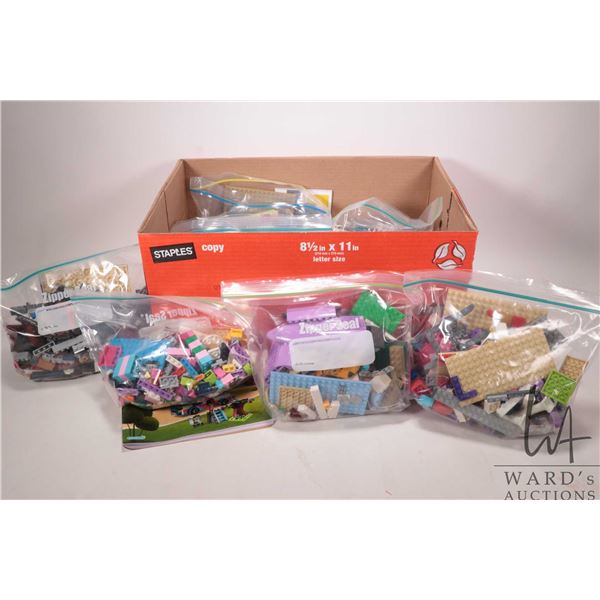 Large selection of Lego building bricks, may includes some pre-built kits but not guaranteed. Bid ac