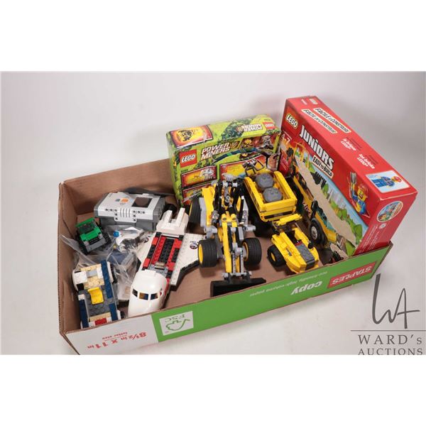 Large selection of Lego building bricks, may includes some pre-built kits but not guaranteed. Bid ac