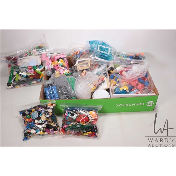 Large selection of Lego building bricks, may includes some pre-built kits but not guaranteed. Bid ac
