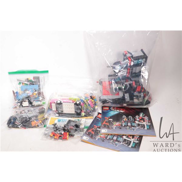 Selection of Lego building bricks including The Lego Movie pre-built kits, no. 70809 with Minifigure
