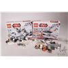 Image 1 : Two Lego-Star Wars pre-built kits including "Rebel Trooper Battle Pack" no. 8083 and "Snowtrooper Ba