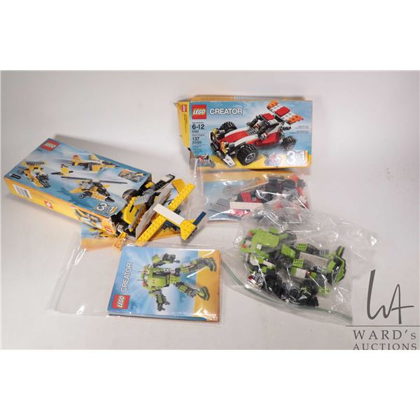 Three Lego- Lego Creator building kits including " Dune Hopper" no. 5763, "Super Soarer" no. 6912 an