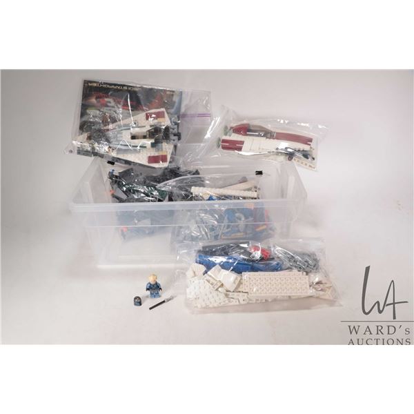 Selection of Lego buidling kits and bricks including Star Wars "Jedi Starfighter" no. 7143, some par