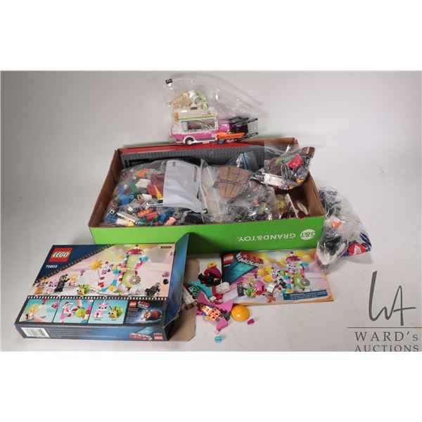 Two Lego-The Lego Movie building kits including "Cloud Cuckoo Palace" no. 70803 and " Ice Cream Truc