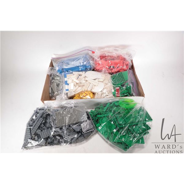 Large selection of Lego building bricks separated into colours