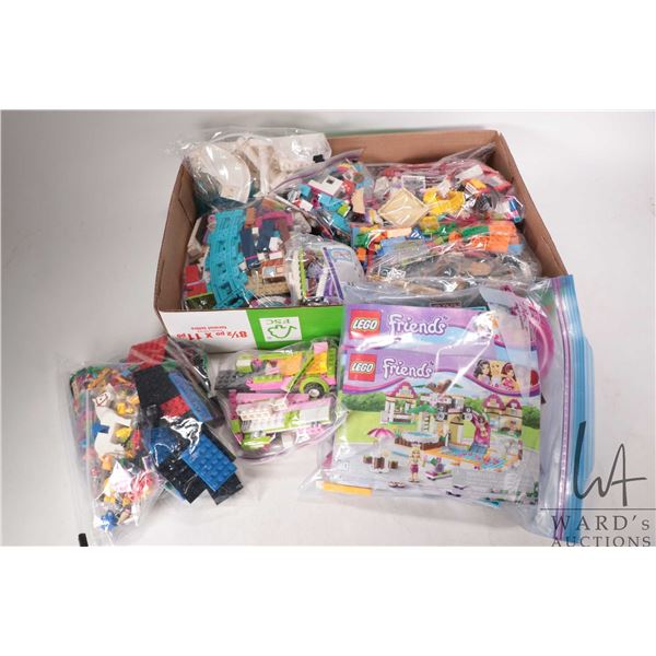 Large selection of Lego Friends building bricks including "Heartlake City Pool" no. 41008, completen