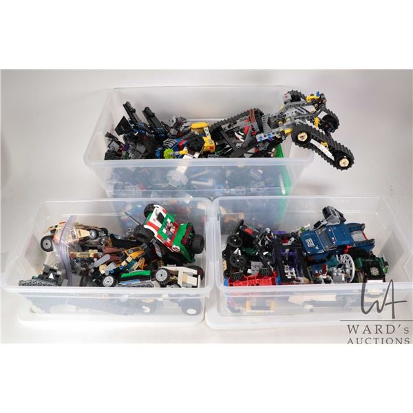 Two plastic containers of Lego building bricks and accessories