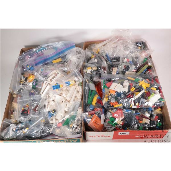 Two large tray lots of Lego building bricks including Star Wars accessories and Minifigures etc.