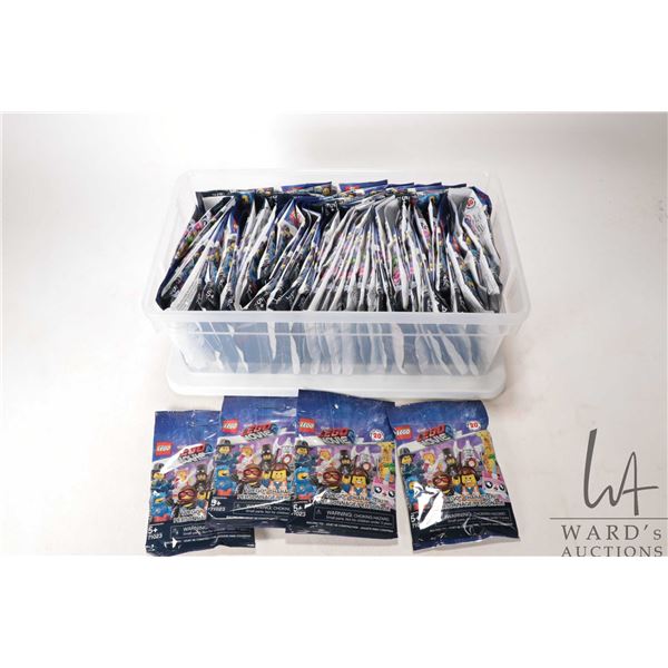 Approximately sixty Lego The Lego Movie Minifigures, all new in packages