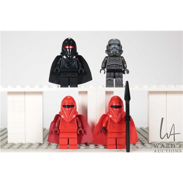 Four Lego Star Wars minifigures including two Imperial Royal Guards, Shadow Trooper, Shadow Guard.
