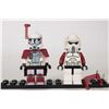 Image 1 : Two Lego Star Wars minifigures including Clone ARC Trooper and Clone ARF Trooper.