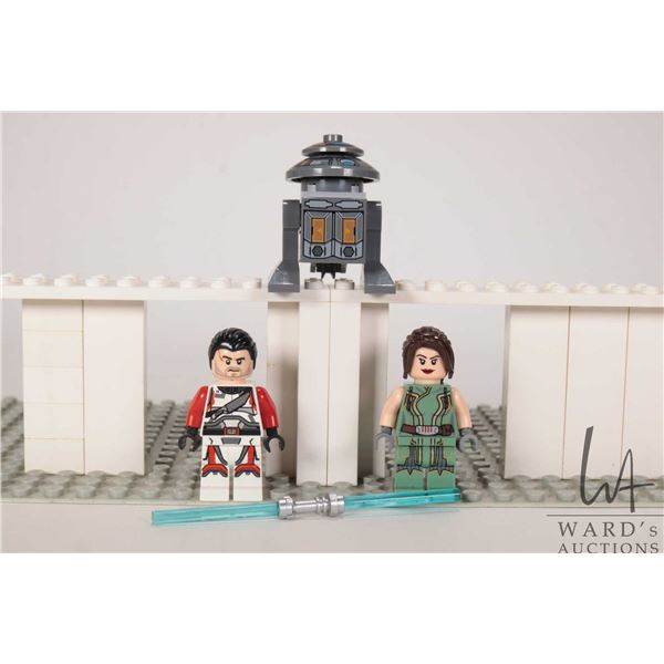 Three Lego Star Wars minifigures including Jace Malcom, Satele Shan, T7-01