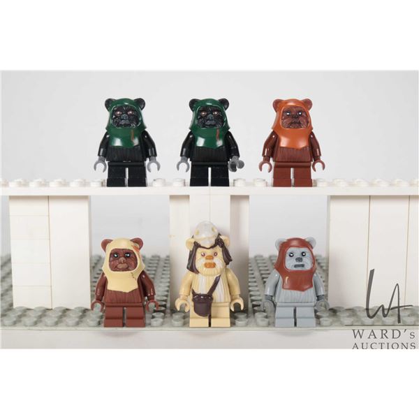 Six Lego Star Wars Ewok minifigures including Wicket, Teebo, Logray, Chief Chirpa, 2 Tokkats, and Pa