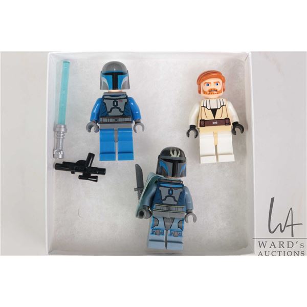 Three Lego Star Wars minifigures including General Obi-Wan Kenobi, Pre-Visla, and 1 Death Watch.