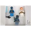 Image 1 : Three Lego Star Wars minifigures including General Obi-Wan Kenobi, Pre-Visla, and 1 Death Watch.