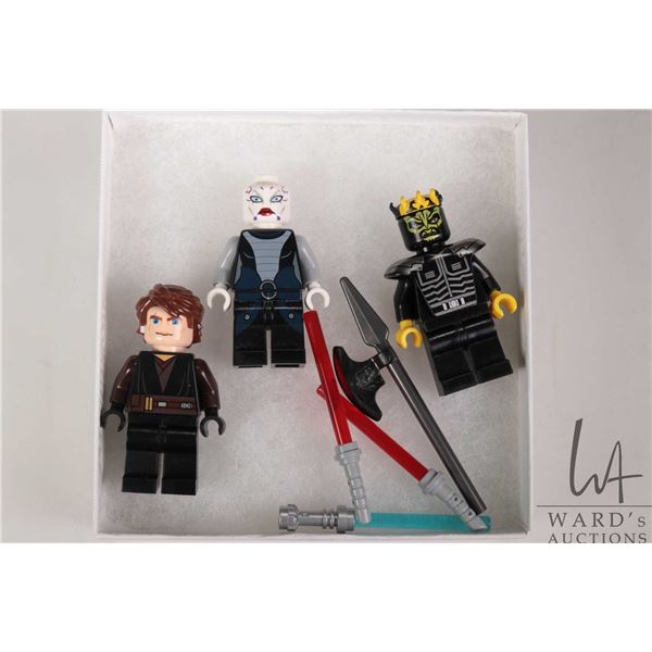 Thee Lego Star Wars minifigures including Anakin Skywalker, Savage Opress, and Asajj Ventress