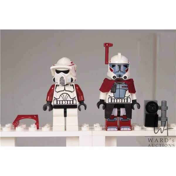 Two Lego Star Wars minifigures including Arc Trooper Hammer and ARF Trooper from set 9488