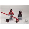 Image 1 : Two Lego Star Wars minifigures including Darth Maul with Mechanical legs and a Mandalorian Super Com