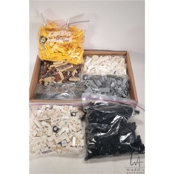 Selection of Lego building bricks in sorted coloured bags