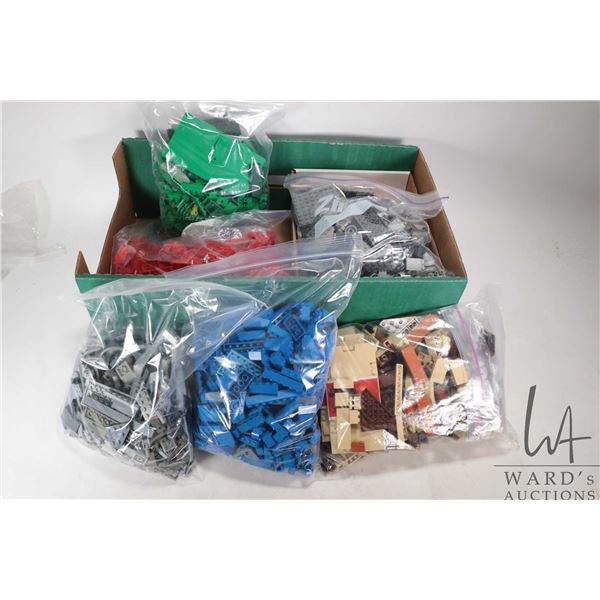 Selection of Lego building bricks in sorted coloured bags