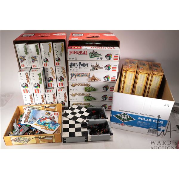 Three boxes of partial Lego games including Chess game, Heroica, Dragon, Ninjago etc.