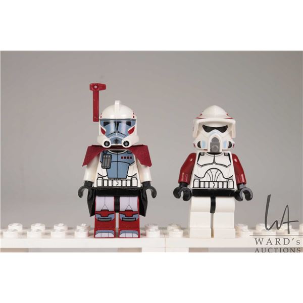 Two Lego Star Wars minifugres including Clone ARC Trooper Hammer, and ARF Trooper.