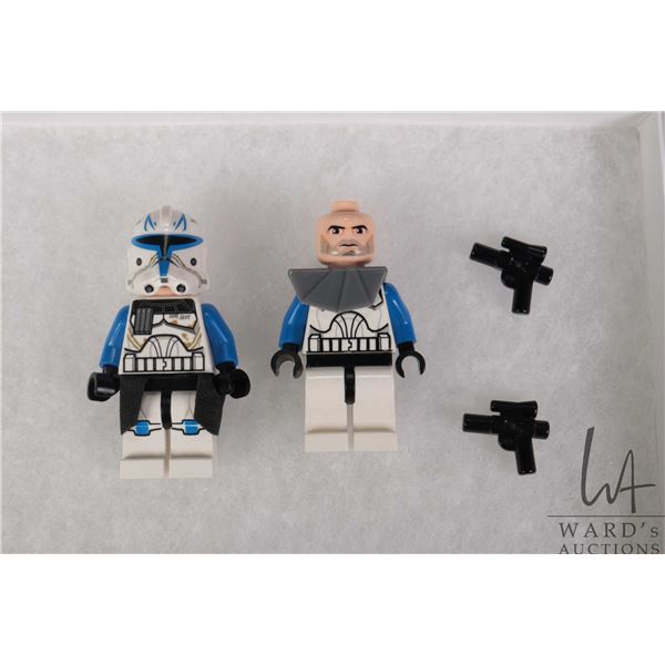 Two Lego Star Wars Captain Rex minifigures. one with Cloth Karma, one with Dark Blueish Gray pauldro