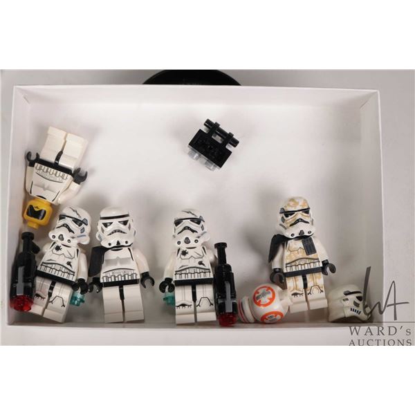Five Lego Star Wars minifigures including Sandtrooper, 2 Jump Troopers, Older Sandtrooper, Scout Tro