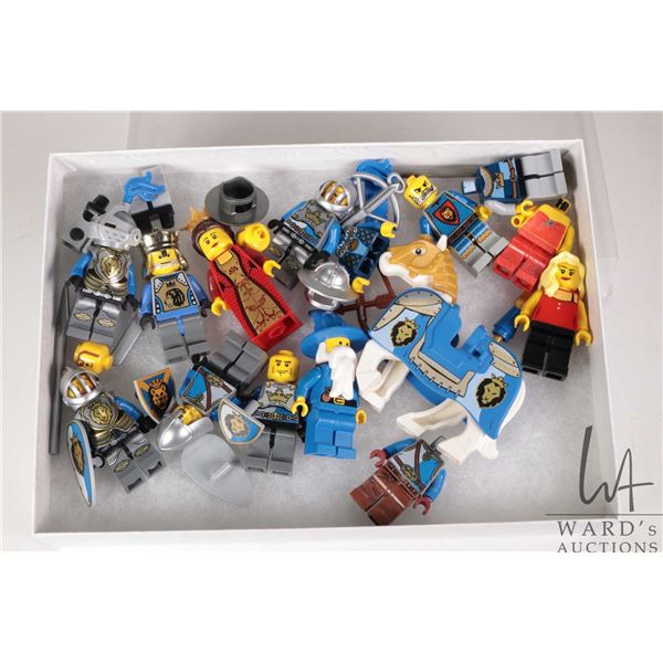 Selection of Lego Kingdoms minifigures including Blue knights, Lion King, Princess in red dress, Hor