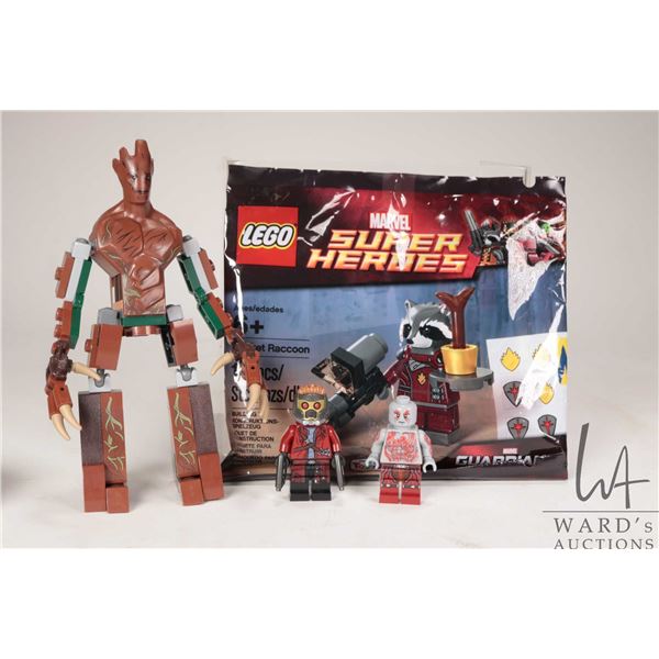 Selection of Lego Marvel Super Heros minifigures Including Star-Lord, Drax, Groot, Rocket Racoon pol