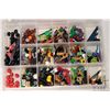 Image 3 : Four plastic containers filled with body parts and accessories for Minifigures